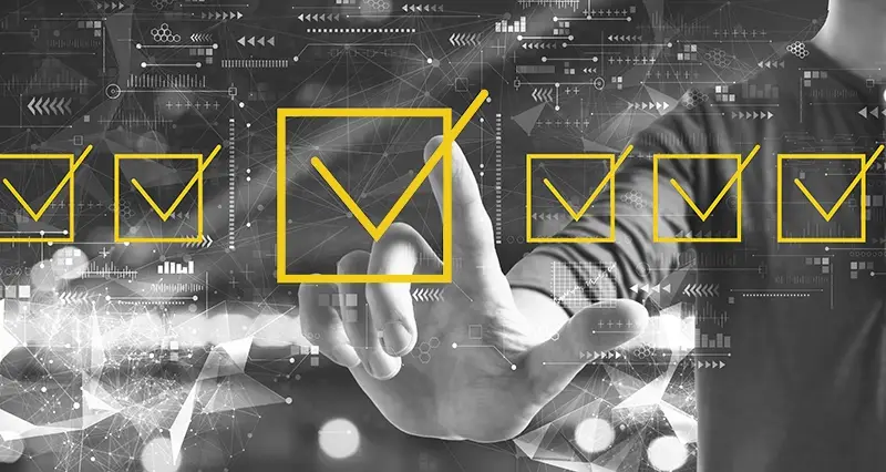 A person pointing at 6 yellow checkboxes, overlaid with computer imagery