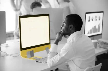 Man looking at monitor at work