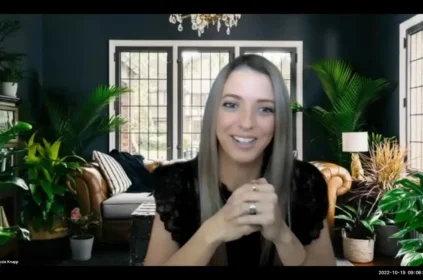 A woman talking to the camera