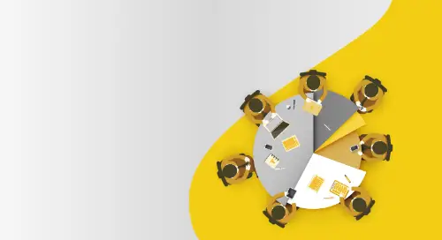 People sitting at a yellow round table